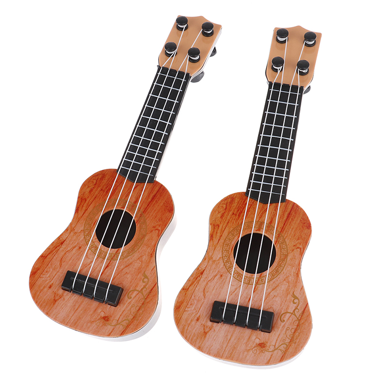 4 string mini guitar on sale tuning