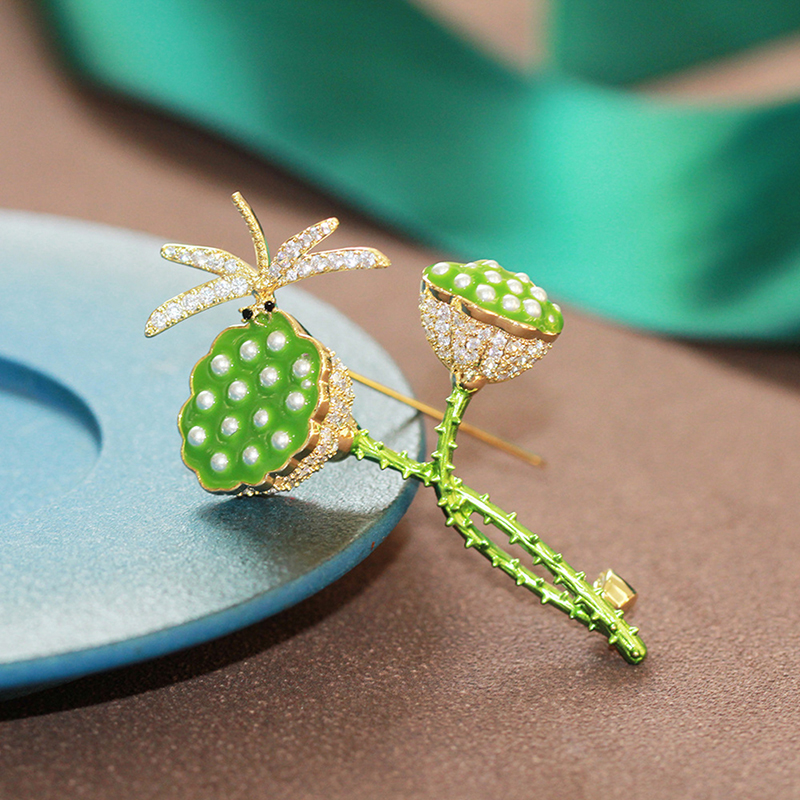 Lotus brooch discount