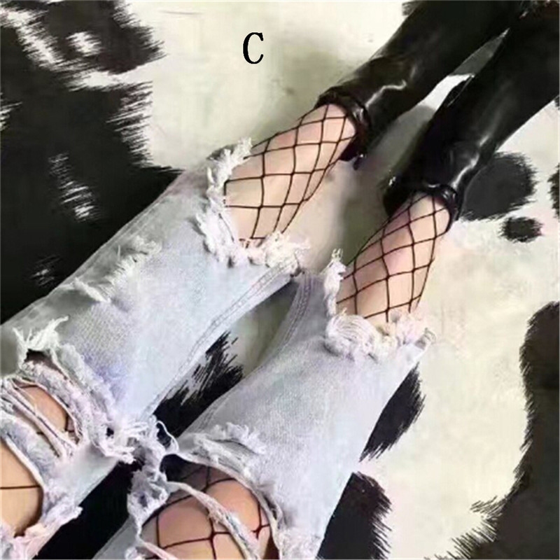 Fishnet stockings with jeans top
